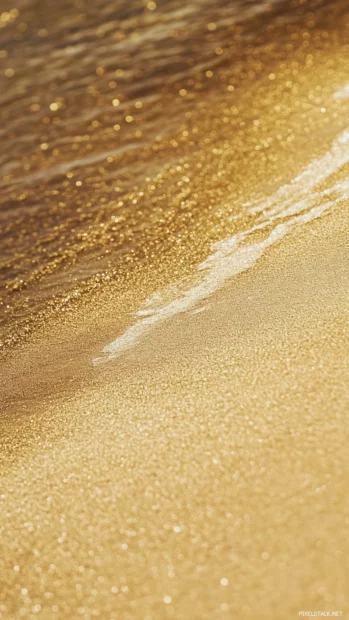 An aesthetic simple wallpaper of a smooth beach with soft, flowing waves and a golden horizon.