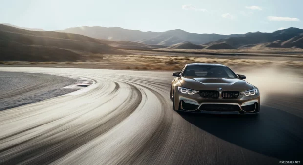 A BMW M4 speeding on a racetrack.