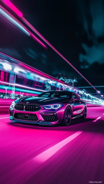 A BMW M8 Gran Coupe cruising down an empty road at night.