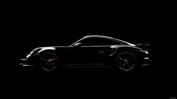 A black Porsche 911 Turbo S 4K wallpaper with its curves subtly outlined by soft edge lighting.