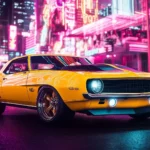 A classic yellow Camaro in front of a neon lit cityscape at night.