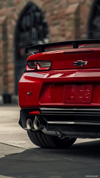 A close up of the rear taillights and exhaust pipes of a Camaro LT1, highlighting its modern design elements .