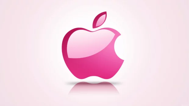 A cool pink Apple logo centered on a soft white background.