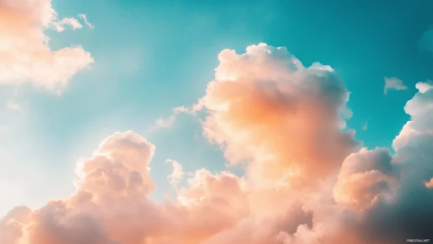 A dramatic sky filled with towering cumulus clouds.