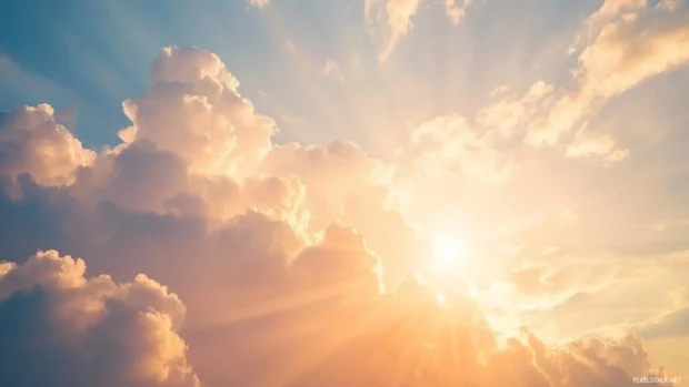 A dramatic sky filled with towering cumulus clouds, illuminated by the golden light of a setting sun.