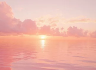 A serene landscape of soft, fluffy clouds drifting over a calm ocean at sunrise, with pink and orange hues reflecting on the water.