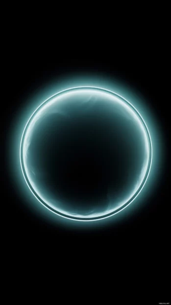 A single ice blue circle wallpaper with a soft glow, centered on a matte black background.