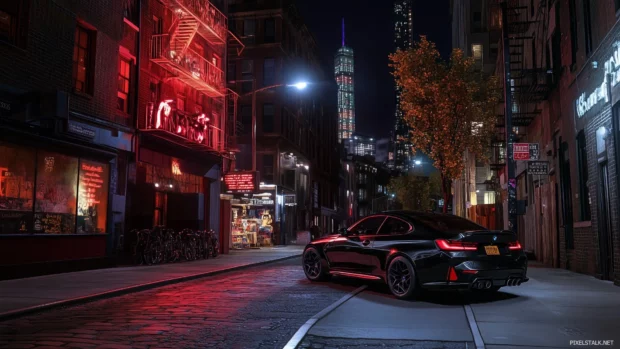 A sleek BMW M parked at night on a city street.