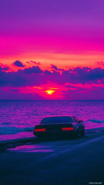 An aesthetic car resting on a beachside road at dusk.