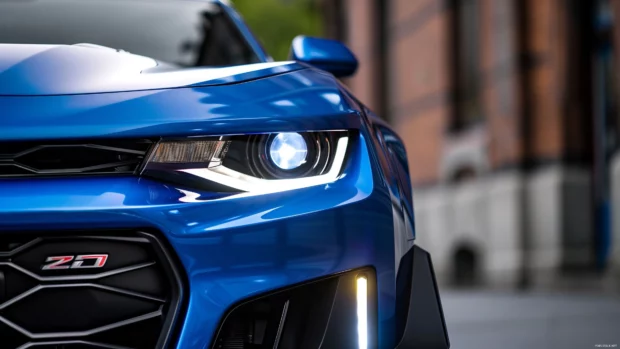 Close up of the aggressive front grille and headlights of a Camaro ZL1.