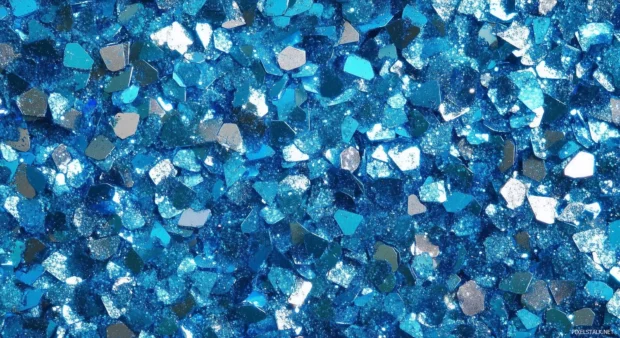 Sparkling blue glitter background with a cool, calming tone.