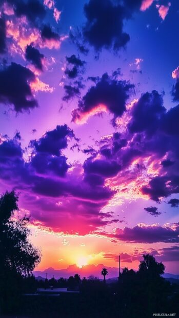 Vibrant purple clouds wallpaper for mobile.