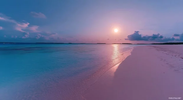 A beach desktop wallpaper with a full moon shining brightly.