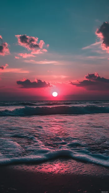 A time lapse photo of a sunset over the blue ocean.