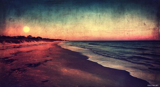 A vintage style wallpaper of a beach at night.