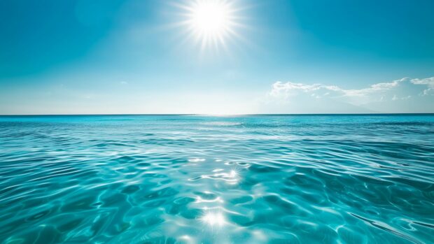A bright and sunny day over a clear blue ocean wallpaper 4K.