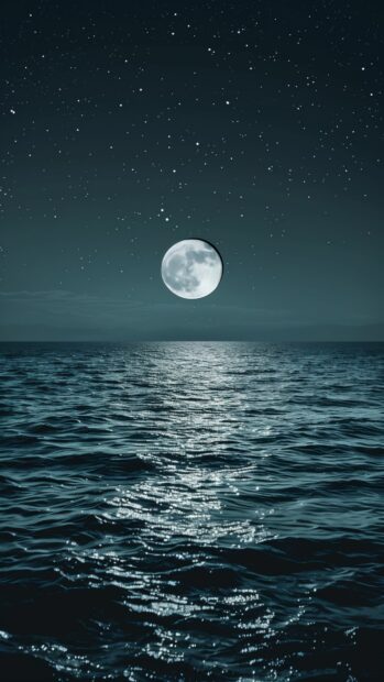 A moonlit Ocean aesthetic wallpaper aesthetic wallpaper with stars reflecting on the calm water.