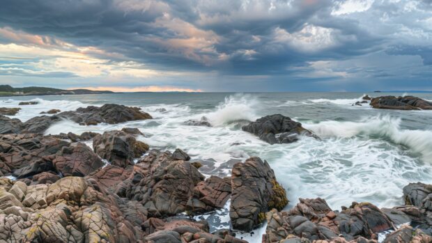 A rocky coastline with dramatic waves and a stormy sky.