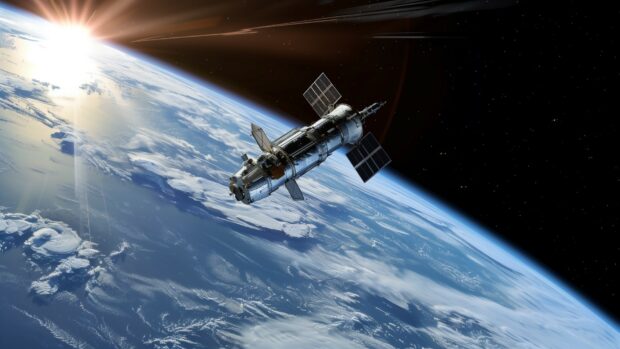 A serene image of the Hubble Space Telescope orbiting Earth, capturing the beauty of space desktop background.