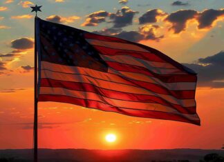 American flag with a sunrise backdrop.