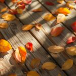 Autumn leaves HD desktop wallpaper with Fall leaves scattered on a wooden surface.
