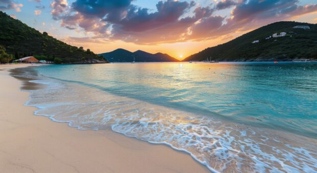 Desktop Wallpaper HD 1980x1080 with a tranquil beach with turquoise waters and a vibrant sunset.