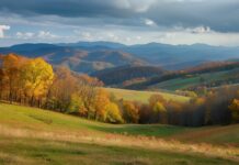 Fall wallpaper features a scenic mountain landscape in fall, high quality photography.