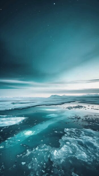 Free download HD Wallpaper Northern Lights over an icy tundra.