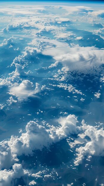 Free download Space iPhone wallpaper with a high resolution Earth from space wallpaper for iPhone, with detailed cloud formations and continents visible.