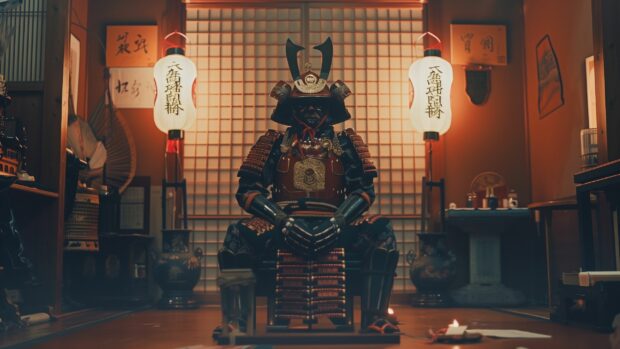 Samurai armor displayed in a museum setting, illuminated by soft lighting to highlight its historical significance (3).