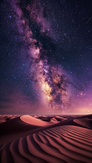 Space iPhone wallpaper HD with a breathtaking view of the Milky Way galaxy from a dark desert landscape, stars shining brightly.