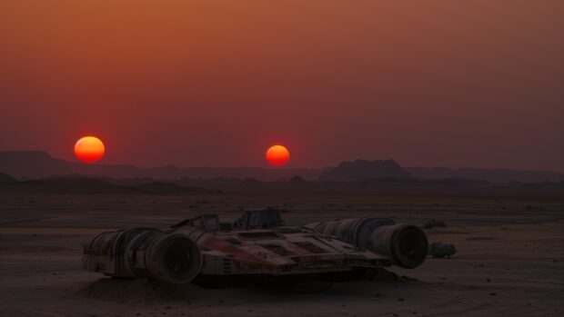 Star Wars Space wallpaper 1080p with a serene view of the twin suns setting over the Tatooine desert, with a silhouette of Luke Skywalker’s landspeeder in the foreground.