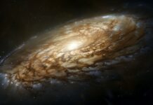 A beautiful barred spiral galaxy 4K wallpaper with prominent arms and a bright core.