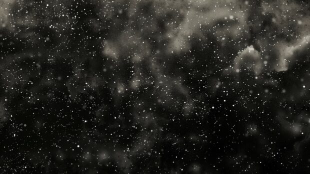 A black galaxy wallpaper 4K with distant stars twinkling faintly, creating a sense of vast emptiness and mystery.