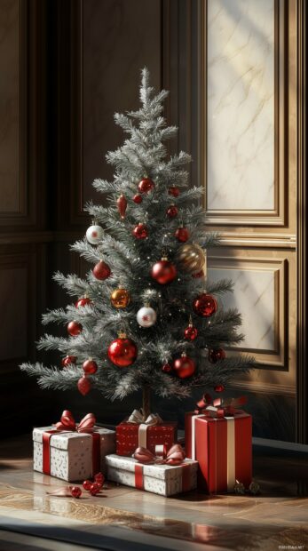 A charming Christmas iPhone Wallpaper with a small, decorated Christmas tree and presents arranged under it.