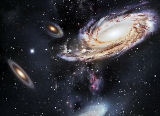 A cool view of multiple galaxies with unique shapes and colors.