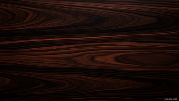 A dark ebony wood wallpaper with deep, rich colors and fine grain.