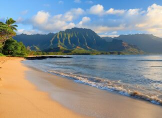 A peaceful morning at Hawaii beach with soft light illuminating the sand and calm waters.