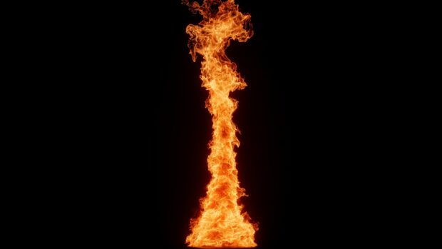 A single towering column of red flames rising from the bottom, illuminating the pure black background with fiery intensity.