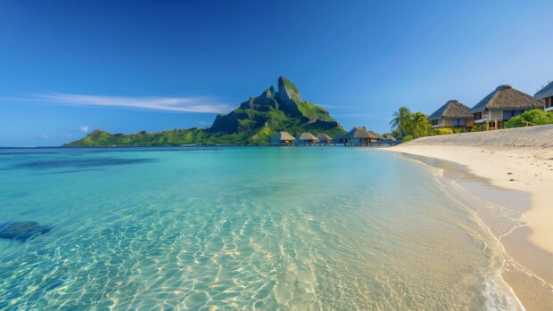 A tropical Fiji beach Desktop 4K Wallpaper with overwater bungalows and a clear, blue lagoon.