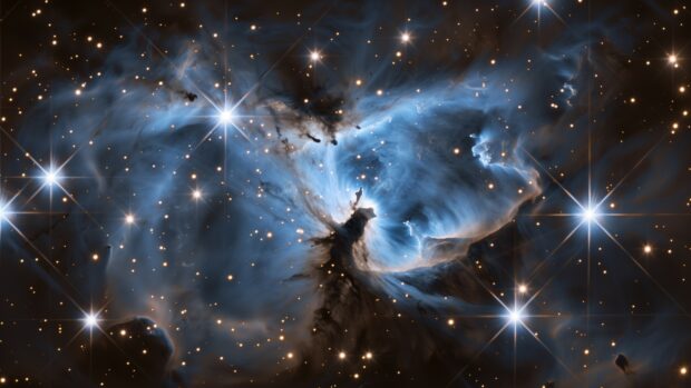 A vivid nebula wallpaper 4K with swirling gases and bright stars.