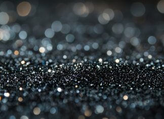 Black glitter 2K QHD background with an intense, bold shine.