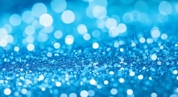 Blue glitter desktop wallpaper with a cool, calming tone.