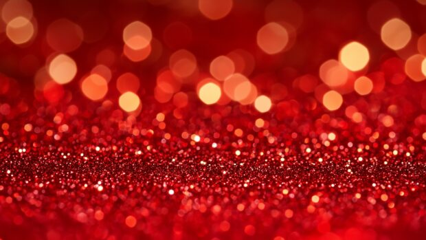 Bold red glitter wallpaper HD with a vibrant, striking shine .