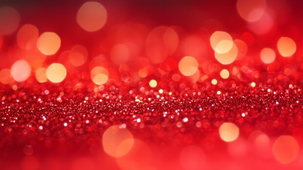 Bright red glitter desktop 4K wallpaper with a striking, dynamic glow.