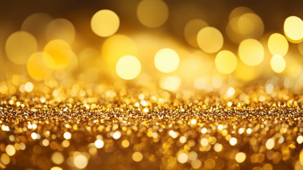 Dazzling gold glitter 4K background with a rich shine.