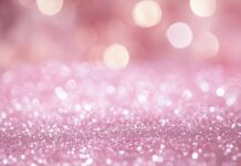 Glitter background 4K in soft pink with a dreamy glow.