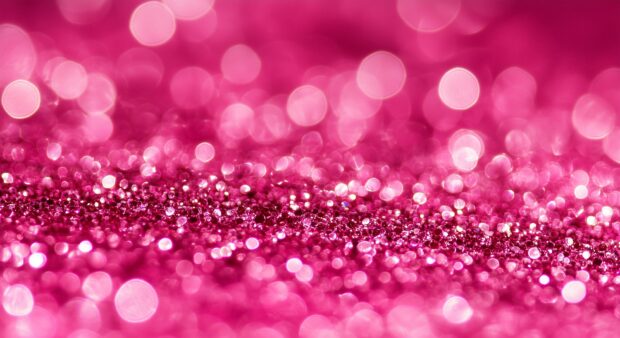 Glittering pink background with a playful, bright sparkle HD wallpaper.