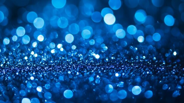 Glittery blue wallpaper with a calm, cool sparkle.