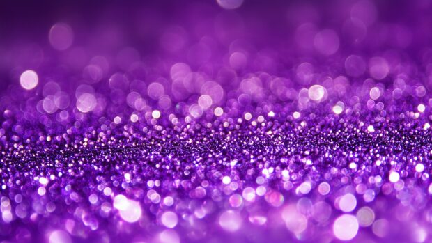 Purple glitter background 4K with a vivid, regal sparkle.